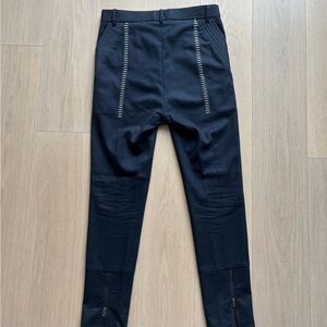 D. GNAK Navy Wool Pants with Zipper Details